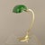 So-called Banker's lamp with a doubly adjustable mechanism: by adjusting the stem and the lampshade, as shown in the...