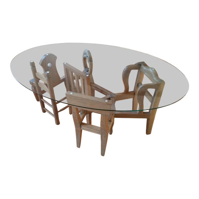 Coffee Table With an Oval Glass Top For Sale