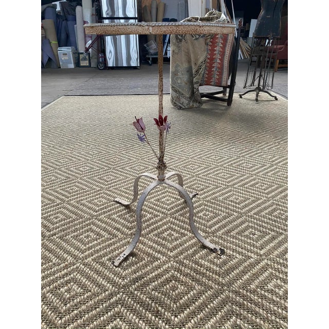 Funky vintage painted metal side table. Simple but artistic with hand made metal flowers. Very practical size and a great...