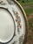The product is a vintage 28 piece Minton Stanwood fine bone china place setting, consisting of 10 dinner plates, 10 salad...