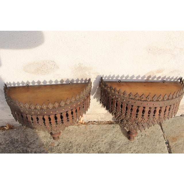 Pair of early 20th-century Tramp Art carved wooden console tables in good condition
