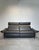 Upgrade your living room with this luxurious set of two dark grey leather sofas, combining contemporary design with...
