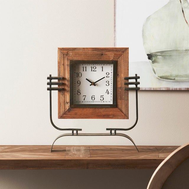 This stylish Wood Square Clock on Rustic Metal Stand is the perfect blend of contemporary and rustic charm. Standing 17.5"...