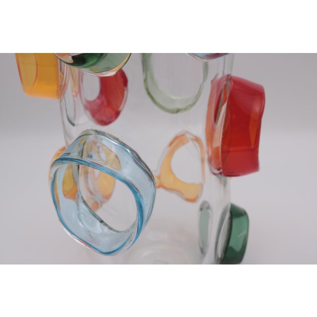 Limited edition art glass vase by Martin Postch. Clear glass with applied multi color prunts. Etched signature on the bottom.