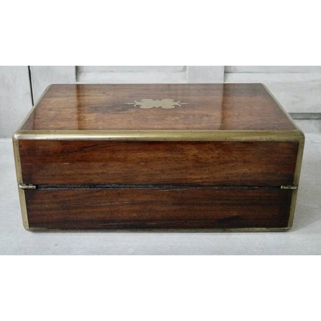 A superb large sized Regency gentleman’s writing slope box. Hand made in England from satinwood with brass inlaid borders,...