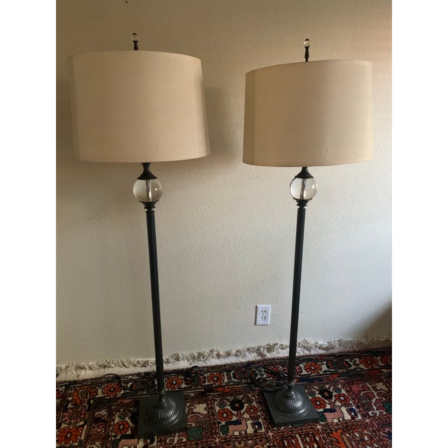 A beautiful, retired pair of "Crystal Ball Urn" floor lamps from Restoration Hardware. Exceptional in weight and build,...