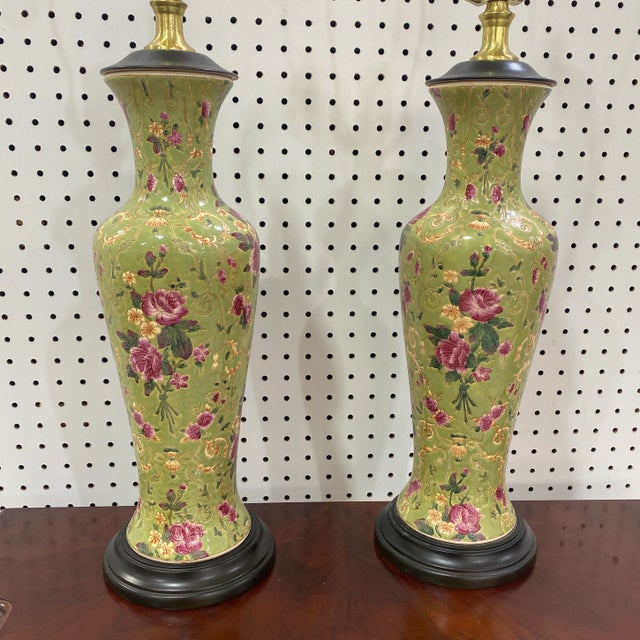 Beautiful pair circa 1960's Chinese celadon table lamp with floral motif. Great size and stature to this pair, hand...