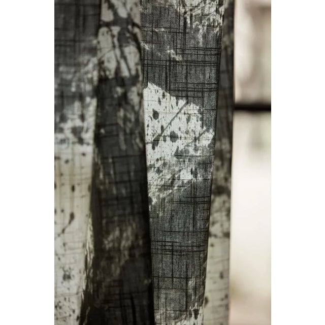 Inspired by the mid-century phenomenon of kinetic art Enigmatic is alive with free-flowing movement. The design was...