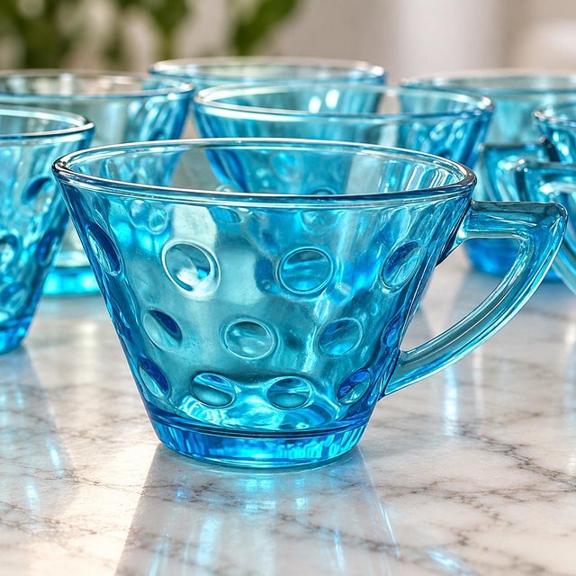 Absolutely stunning set of 8 vintage Hazel-Atlas Capri Dots glass teacups in a breathtaking turquoise/aqua blue! Dating to...