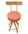 This stylish pair of restored rattan barstools features twisted leg bases, circular footrests, and vibrant orange...