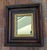 We are selling this adorable little mirror. This miniature mirror could have housed a portrait of photo at one time but...