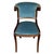 A Regency style mahogany side chair newly reupholstered in blue velvet, showcasing graceful neoclassical lines and finely...