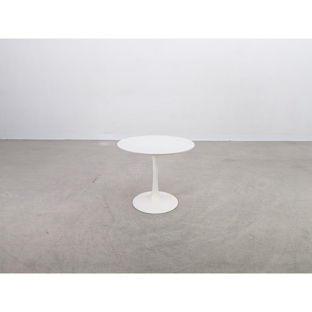 Beautiful Tulip coffee table from the renowned British manufacturer Arkana for sale. Designed by Maurice Burke, the table...