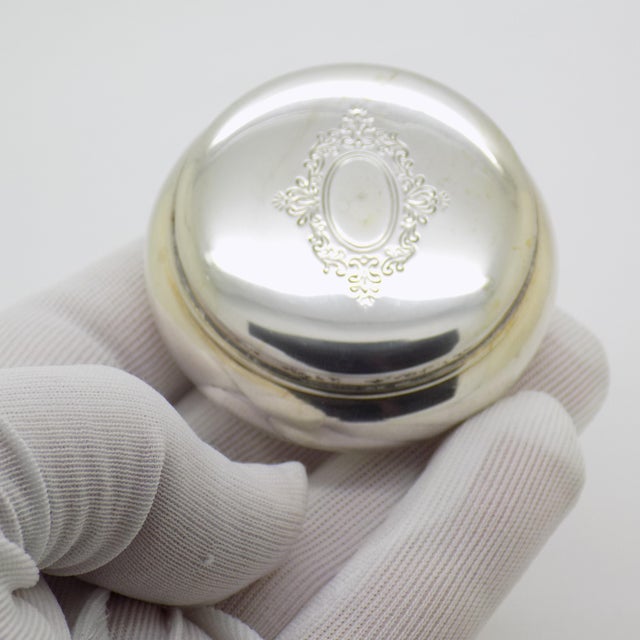 A round pill or snuff trinket box crafted in Italy during the 1970s/1980s. The piece is hallmarked 800 which stands for...