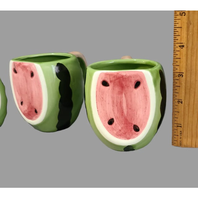 Add a pop of color to your drinkware collection with these vintage hand-painted watermelon mugs. The set of four ceramic...