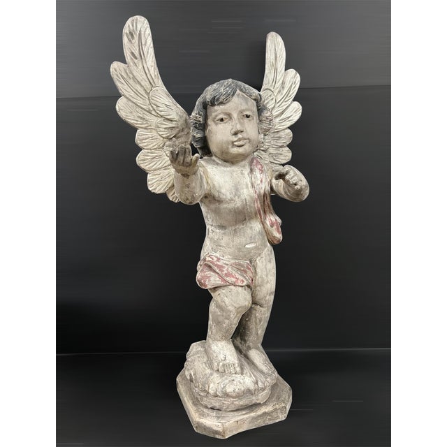ITEM NAME: Late 20th Century Hand Carved Wood Anel with Glass Eyes Sculpture ORIGIN: Philippines AGES: Late 20th Century...