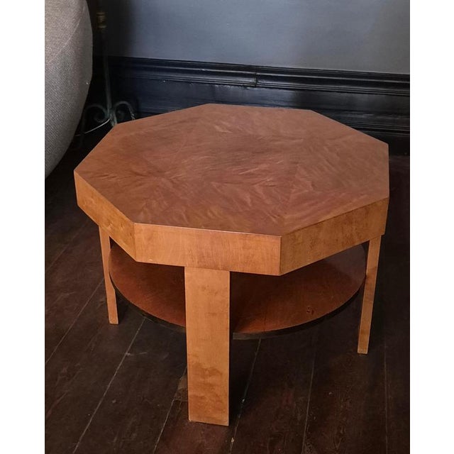 A two-tier Finnish Modern / Art Deco coffee / side table in elm burl wood veneer, Finland 1930/40s. Octagonal top with a...