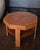 A two-tier Finnish Modern / Art Deco coffee / side table in elm burl wood veneer, Finland 1930/40s. Octagonal top with a...