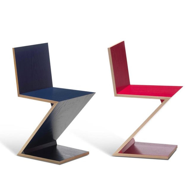 Gerrit Thomas Rietveld Set of Two Zig Zag Chair For Cassina Designed by Gerrit Thomas Rietveld in 1934 and quickly deemed...