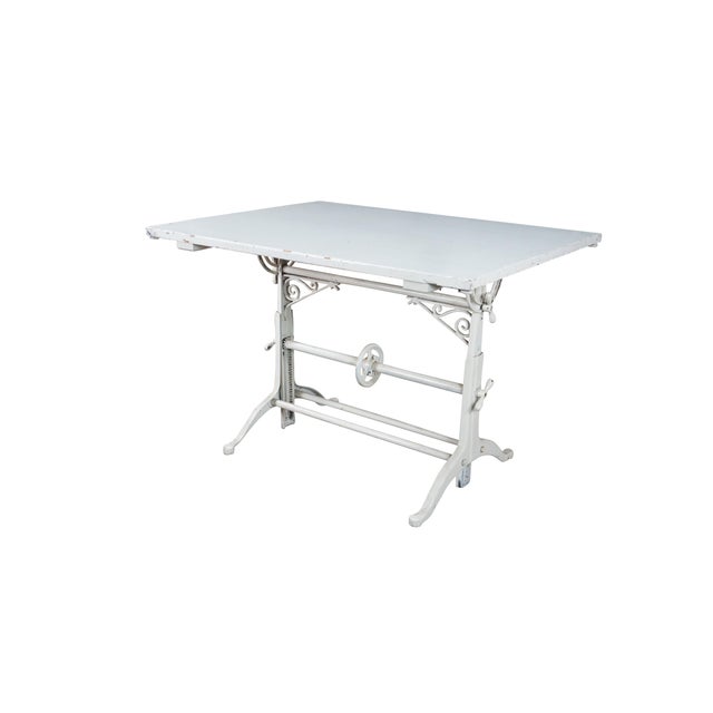 This exceptional antique industrial drafting table showcases an extraordinary blend of mechanical engineering and vintage...