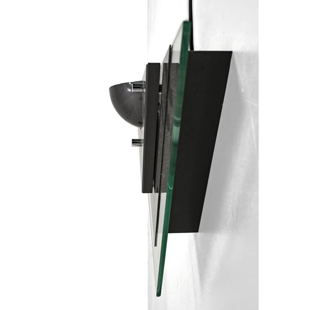 Cool zeta wall lamp by dijkstra from the 80s. The light it shines almost seems to get green through the glass. Marked on...