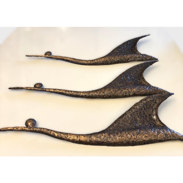 Spectacular, three-piece set of imposing, brutalist wall sculptures in the shape of birds, crafted by the well-known...