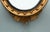 Regency style round mirror finely carved with a gilt finish Surmounted by the carved eagle at the top Glass is convex so...