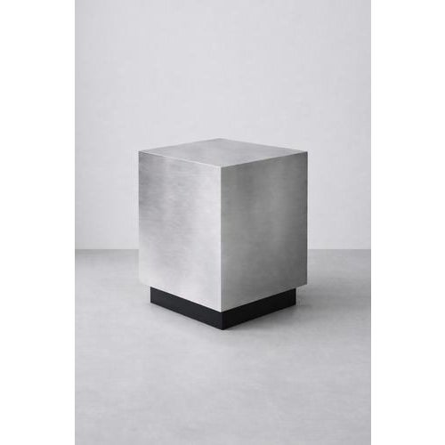 Floating Side Table in Brushed Aluminum by Veliento. Dimensions: W 50 x D 35 x H 50 cm. Materials: Aluminum. Veliento is a...