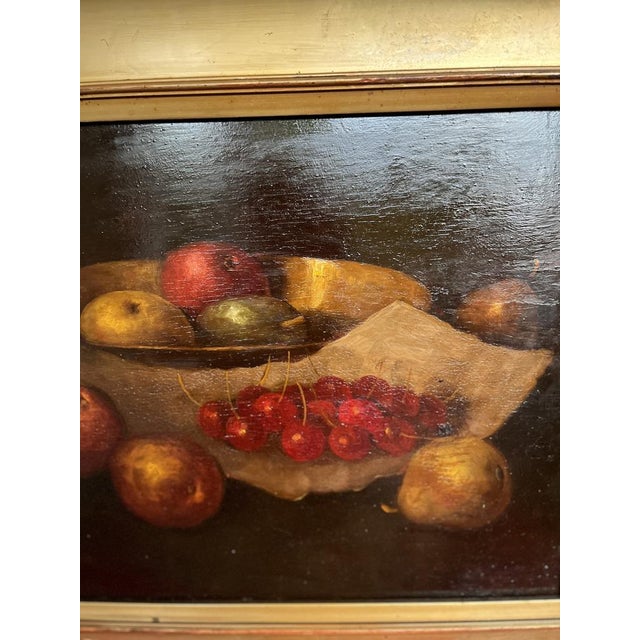 An atmospheric antique European still life oil painting [on Panel- wood board] depicting an elegant arrangement of fruit...
