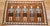 This vintage Native American Navajo Yei rug, woven in the mid-1900s, features a powerful and visually captivating design...