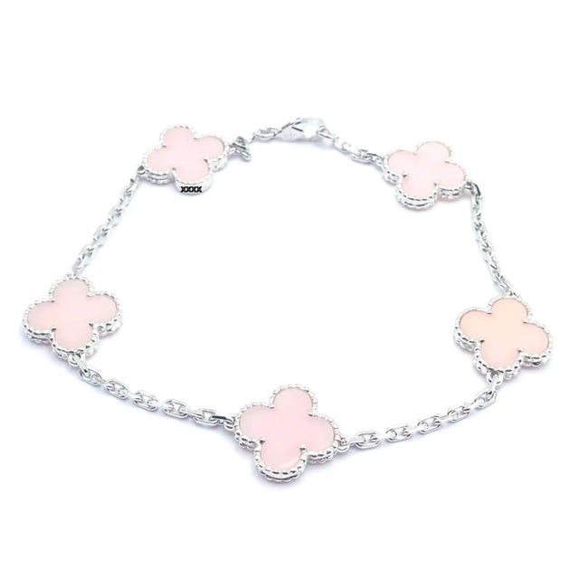 18k White Gold 5-Motif Pink Opal Vintage Alhambra Bracelet by Van Cleef & Arples. *This bracelet comes with Van Cleef &...