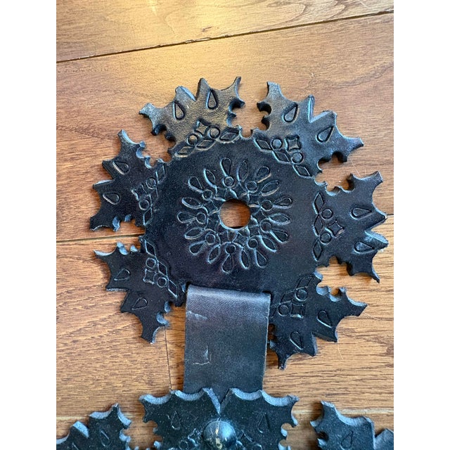 Vintage Brazilian hand-tooled leather mirror, 1960’s. Crafted from thick, deeply embossed saddle leather featuring a...