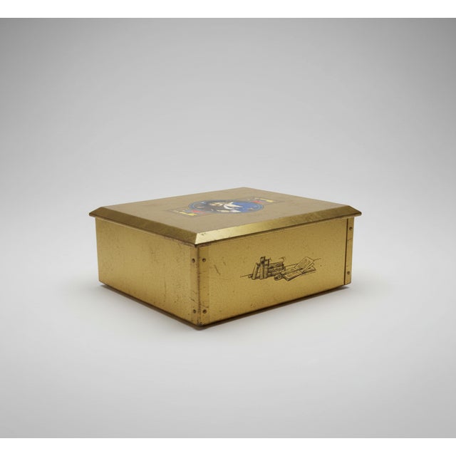 Vintage Raphael El Entawi Tobacco Humidor Tin Box, gold-tone metal with wood base. Features a classic colorful...