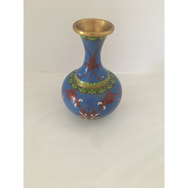 Colorful vintage cloisonné vase in blue, green white and red metal work. No dings or dents. Circa 1940’s. Measure 6.25” x...