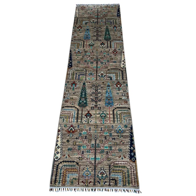 A borderless garden runner in the cypress and willow design of classic Bakhtiari and Bidjar weavings, hand-knotted in...