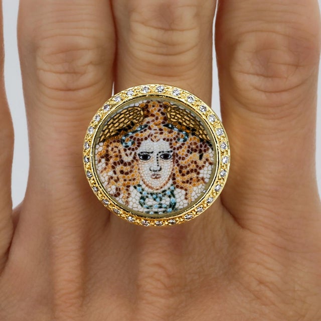 18k Ring with micro mosaic inlay and 29 round brilliant diamonds weighing approximately 0.40 carats. 19.86 grams size 5