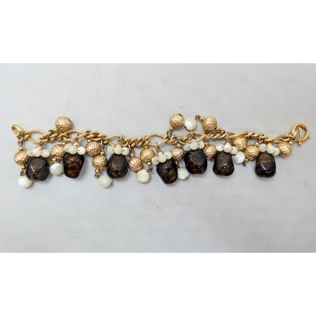 Vintage 1960s Signed Napier Goldtone Faux-Topaz & Mother of Pearl Charm Bracelet For Sale In Philadelphia - Image 6 of 14