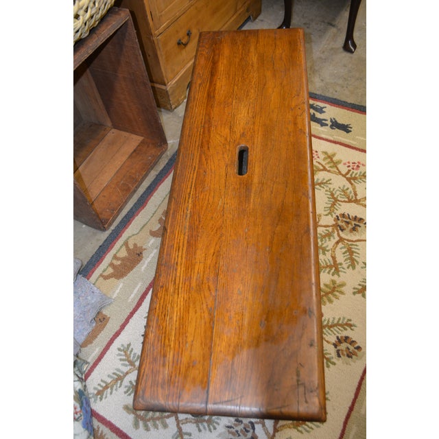 This is a heavy & solid wood / log bench. I believe it to be oak. Made by Old Hickory, Indiana. Quite smooth on top. Used,...