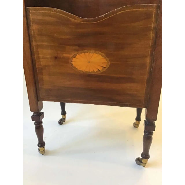 1920s English book rack. I’m actually not sure what this was used for. It has 5 holes drilled on the inside of it. Nice...