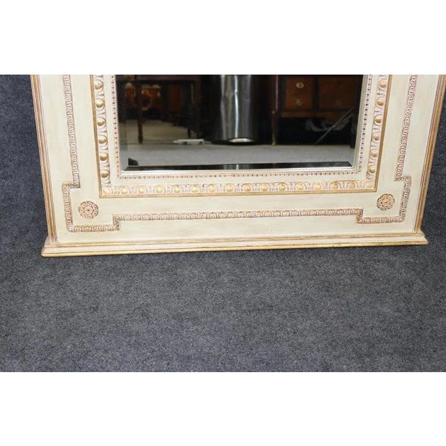 This exquisite French Louis XV style painted trumeau mirror embodies the timeless elegance of 18th-century design, making...