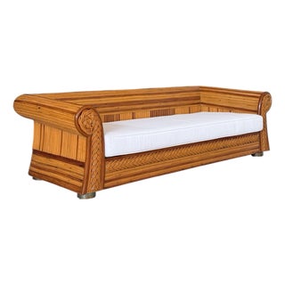 Mid-20th Century Pencil Reed Rattan Sofa With Sculptural Rolled Arms & Brass Cap Feet For Sale