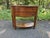 Ballard Designs Newport Demilune Table . it features curved drawers, tapered legs, half-moon lower shelf, metal knobs...