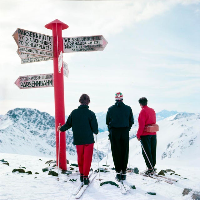 Klosters Signpost by Toni Frissell A group of skiers decide which run to take, Klosters, Switzerland, 1951. (Photo by Toni...