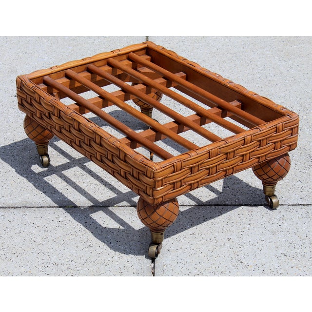 A beautifully crafted vintage rattan piece with a low, rectangular profile and intricate handwoven latticework throughout....