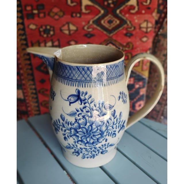18th-century Liverpool pitchers were mass-produced creamware and delftware jugs exported worldwide as cheap cargo and ship...