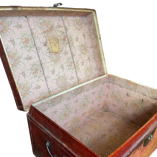 Beautifully weathered and much sought after Qing Dynasty (pre-1900) lightweight lacquered leather trunk. Original iron/...