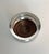 Elegant vintage Sheffield silver-plated bottle coaster with a beautifully pierced gallery, beaded rim, and turned hardwood...