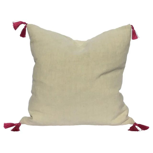 A small contemporary pillow made with our favorite softlinen and embellished with an Ikat jacquard border in bright colors...