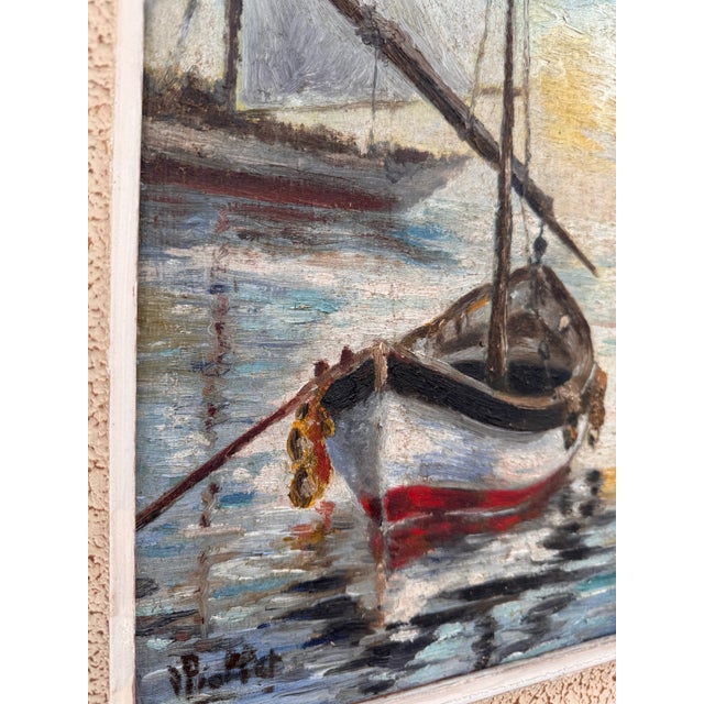 This original oil on canvas depicts a little sailboat, called a tender boat, ready to bring passengers to shore and back....