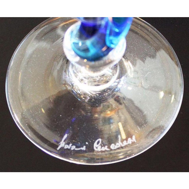 Price reduced $200. Now only $790! Lovely set of 4 wine glasses, and decanter with stopper. Beautiful aqua coloring on...